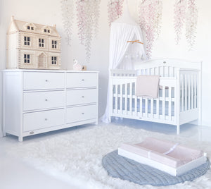 Heritage cot with 6 drawer chest in baby room